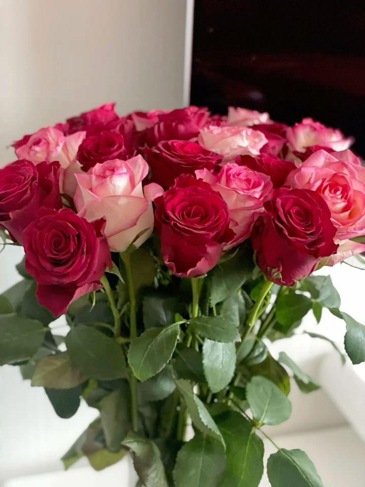 Professional floral arrangement in modern corporate setting